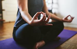 woman sitting in a yoga pose